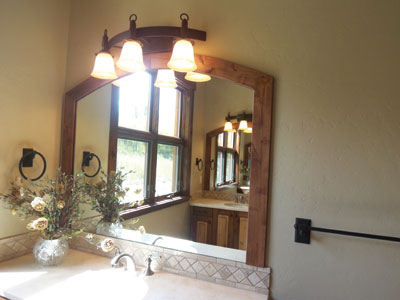 Wall-Mounted Mirror Encased in Wood
